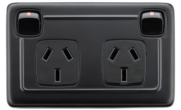 2 Gang Flat Plate Rocker Switches with Double Socket by Tradco