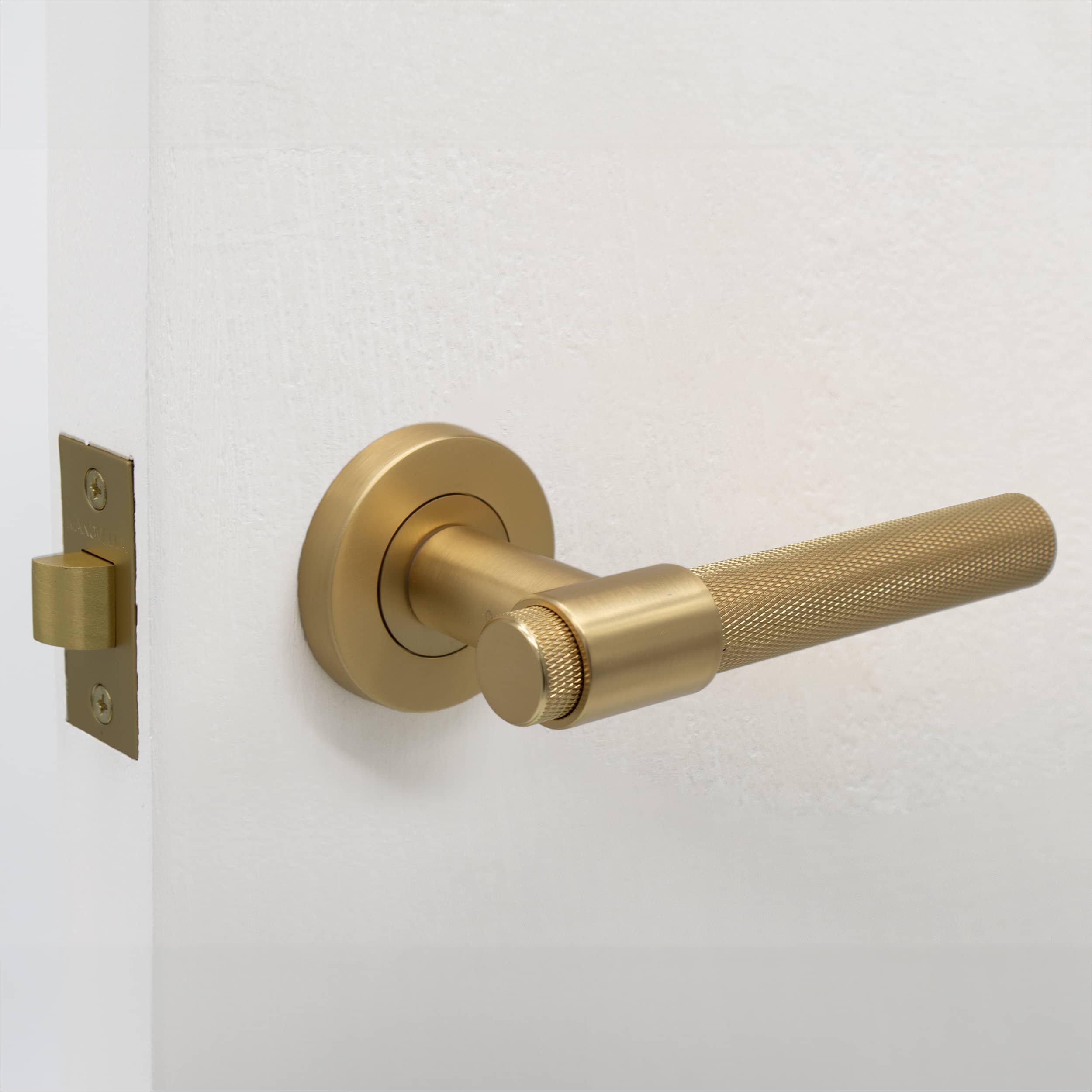 Satin Brass Knurled Passage Door Handle - Rosedale - Manovella